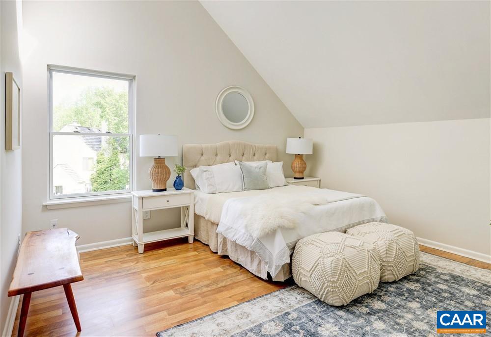700 Merion Greene Charlottesville, VA 22901 - Photo 14 of 40 a bedroom with a bed and a window