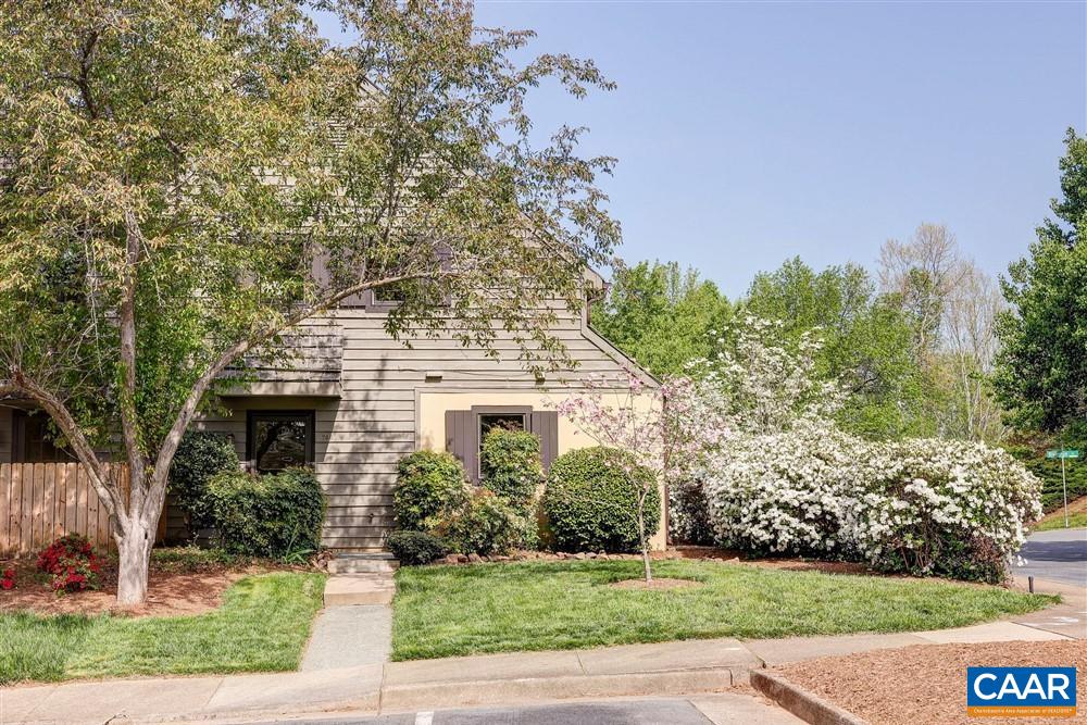700 Merion Greene Charlottesville, VA 22901 - Photo 2 of 40 a front view of a house with a yard