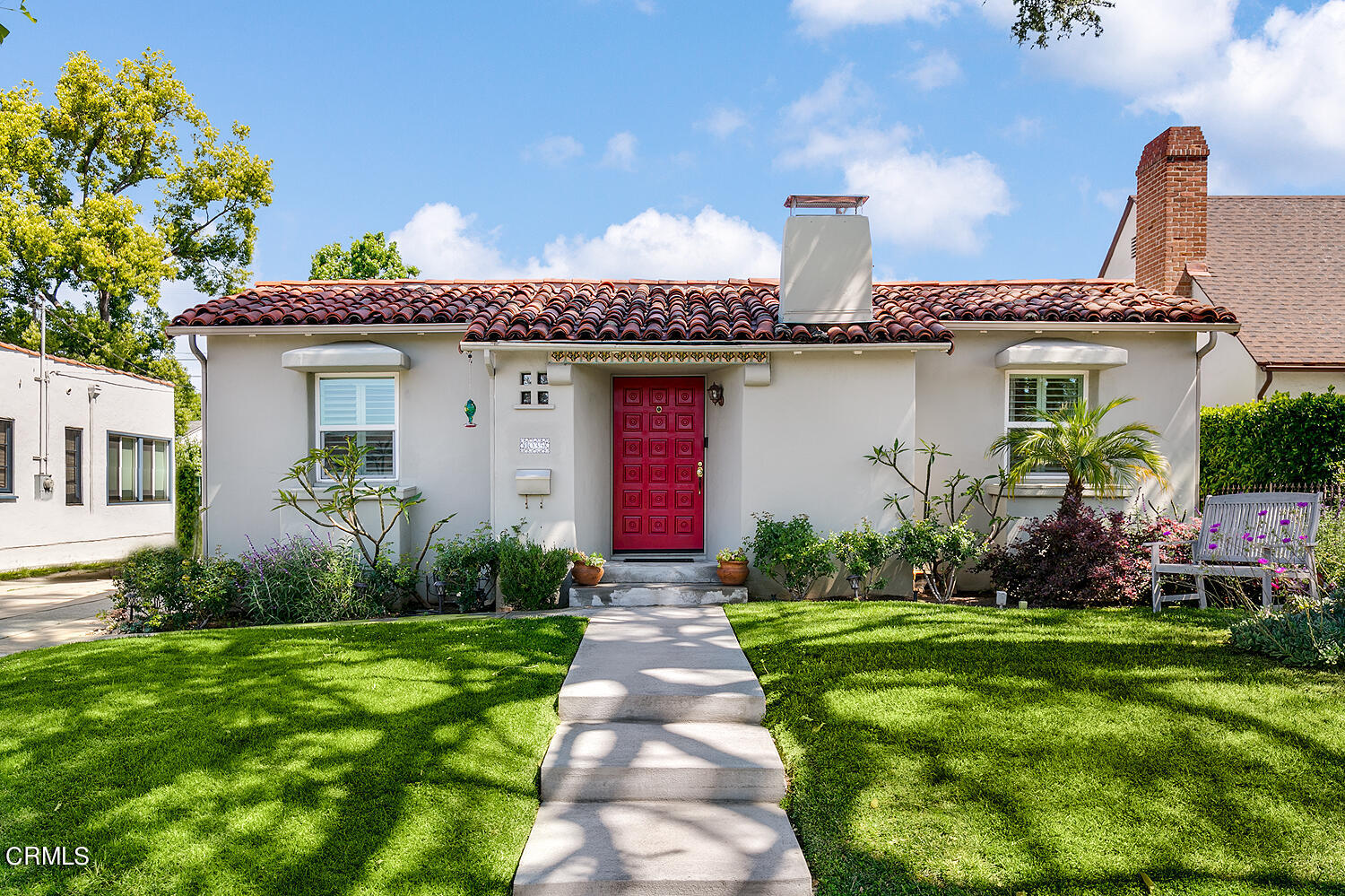 1035 West Roses Road San Gabriel, CA 91775 - Photo 1 of 28 a front view of a house with garden