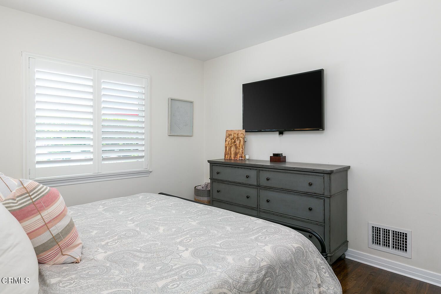 1035 West Roses Road San Gabriel, CA 91775 - Photo 20 of 28 a bedroom with a bed and a flat screen tv