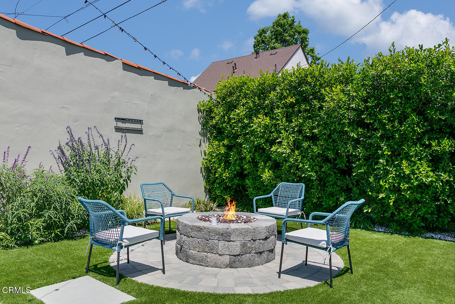 1035 West Roses Road San Gabriel, CA 91775 - Photo 28 of 28 a patio with a table and chairs and potted plants