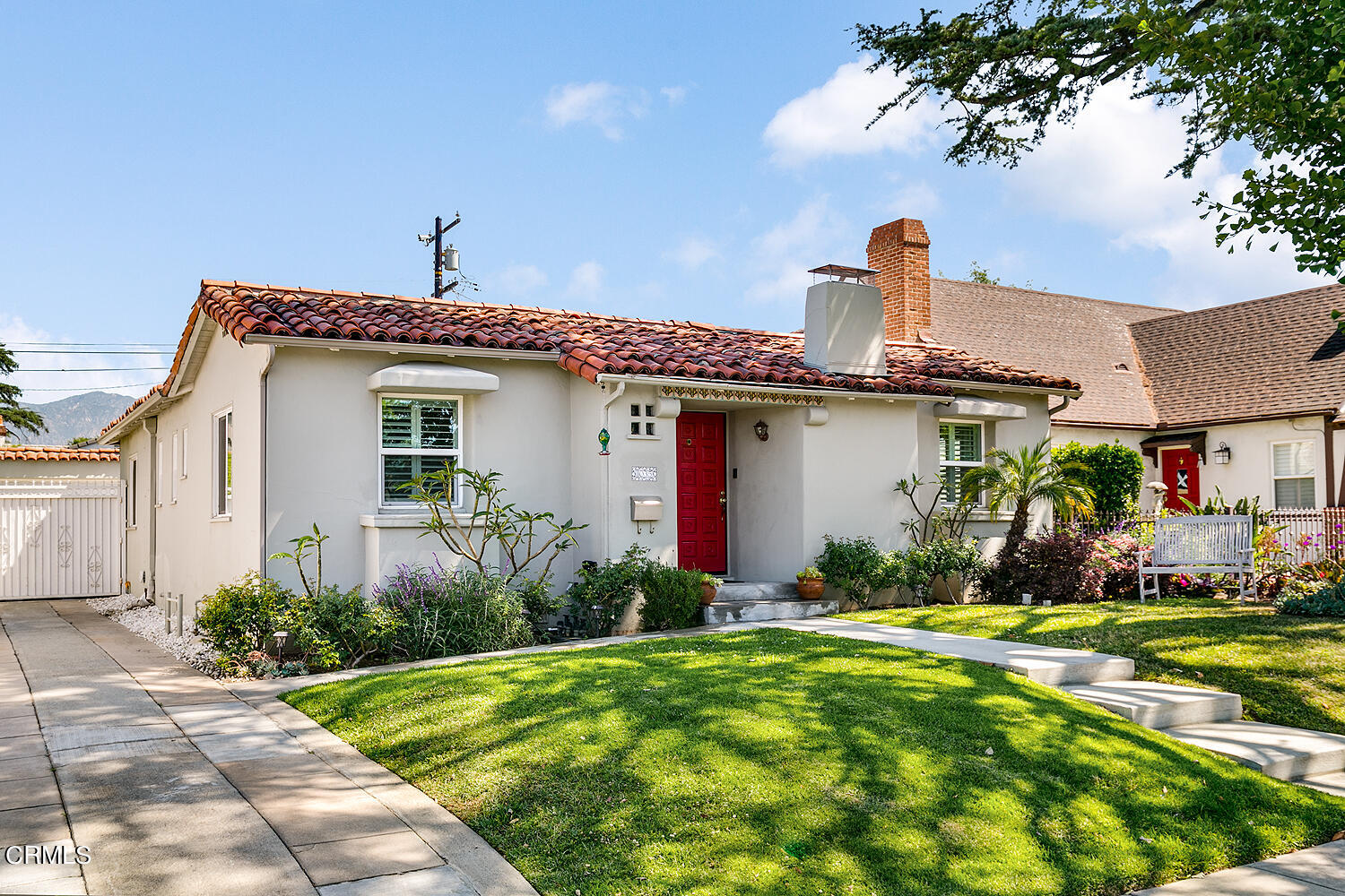 1035 West Roses Road San Gabriel, CA 91775 - Photo 3 of 28 a front view of a house with garden