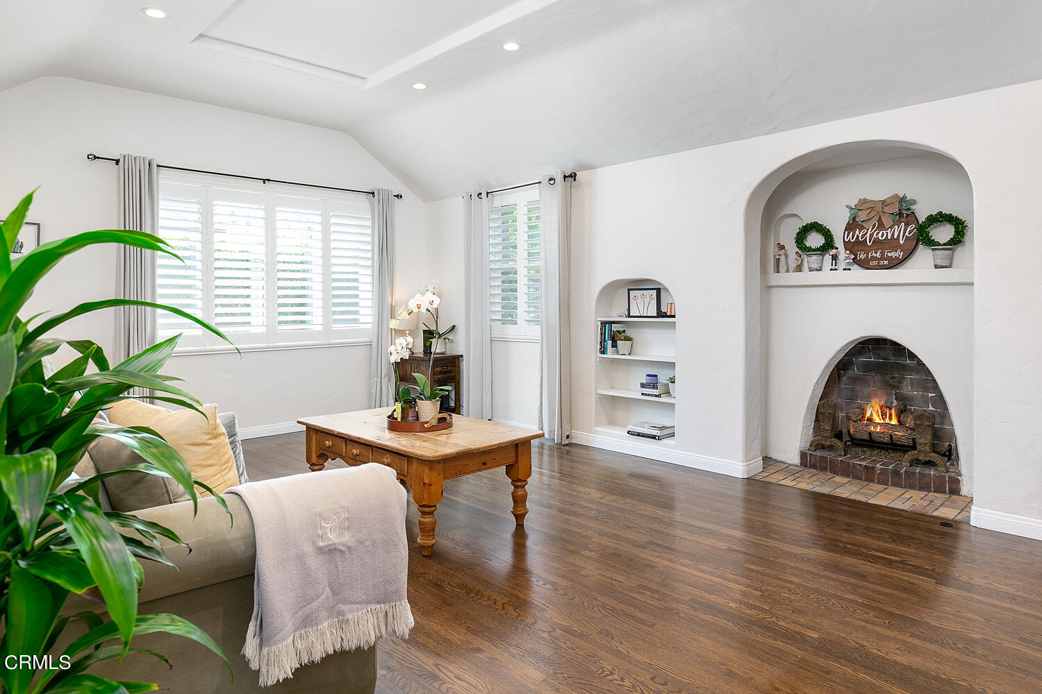1035 West Roses Road San Gabriel, CA 91775 - Photo 5 of 28 a living room with furniture and a fireplace
