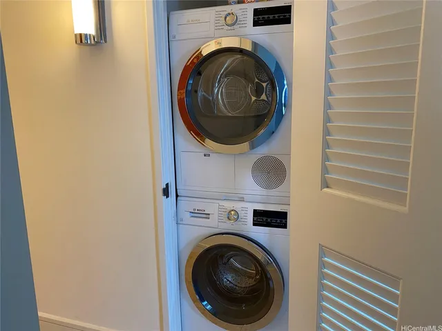a bathroom with a sink toilet and mirror