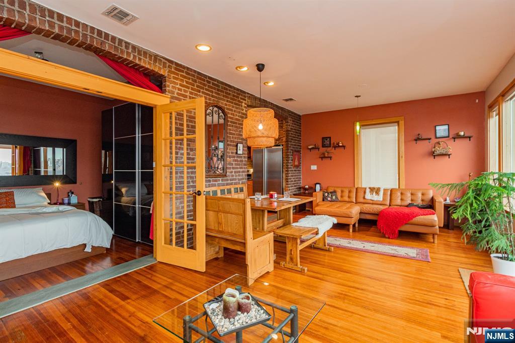 152 Pine Street Cliffside Park, NJ 07010 - Photo 12 of 15 a very nice looking room with a large window and furniture