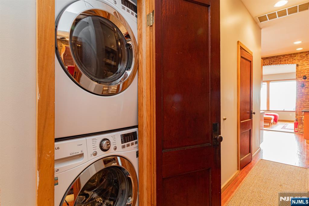 152 Pine Street Cliffside Park, NJ 07010 - Photo 8 of 15 a view of a hallway with washer and dryer