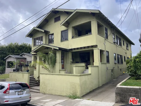 a front view of a house with a garage
