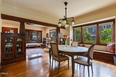 a kitchen with cabinets and a stove top oven
