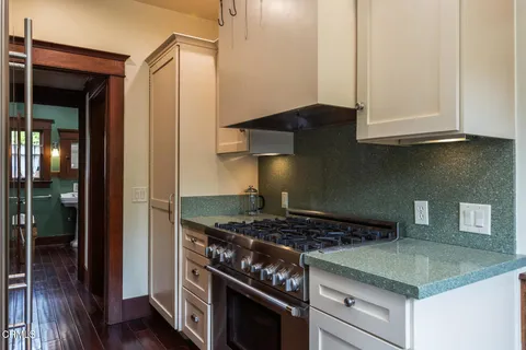 a view of a hallway with washer and dryer