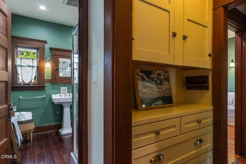 a bathroom with a sink and shower