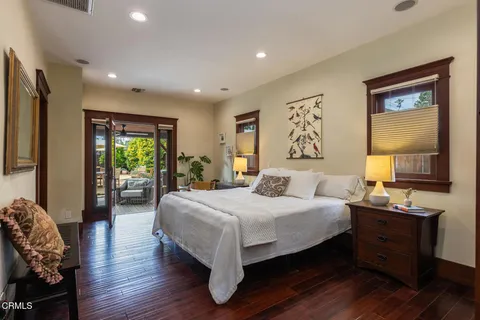 a living room with furniture a window and a table