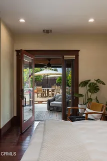 a bathroom with a shower and a mirror
