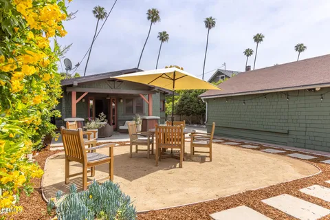 a view of yard with patio