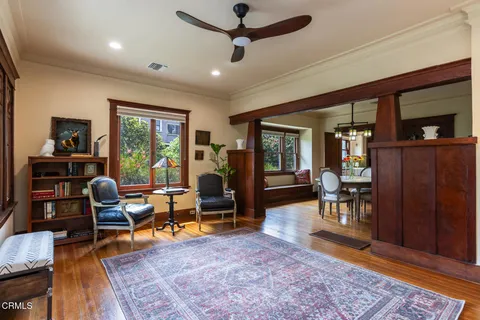 a view of a dining room with furniture window and outside view
