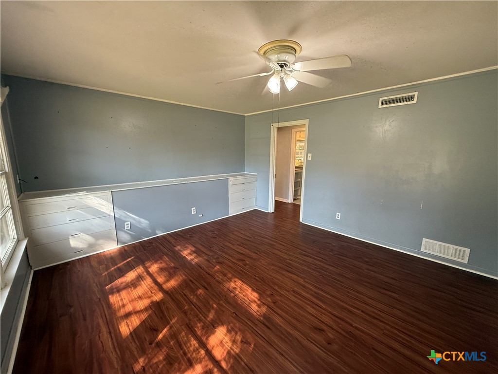 1701 North 13th Street Temple, TX 76501 - Photo 31 of 48 a view of empty room with wooden floor
