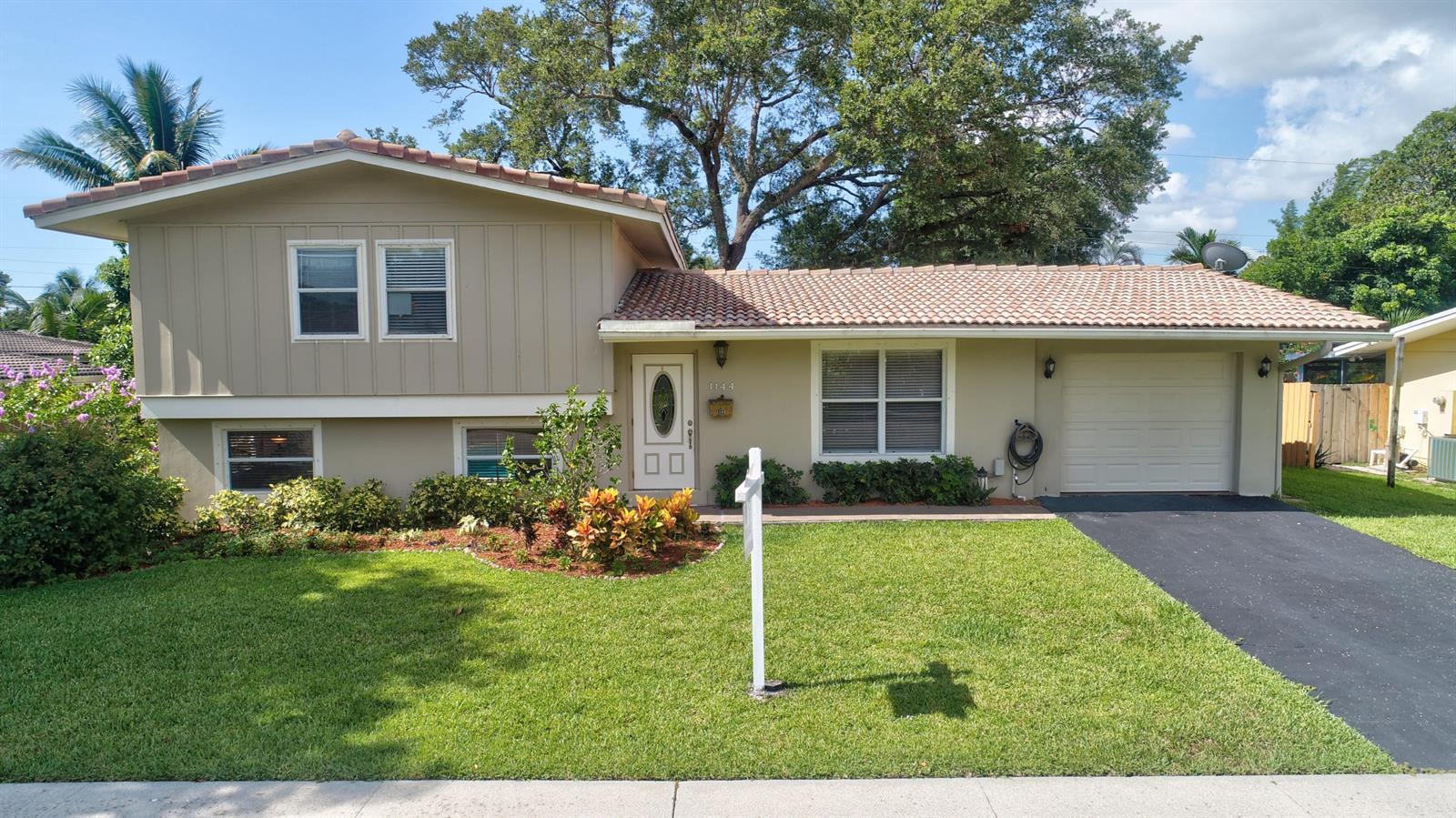 1144 Southwest 4th Street Boca Raton, FL 33486 - Photo 1 of 42 FRONT