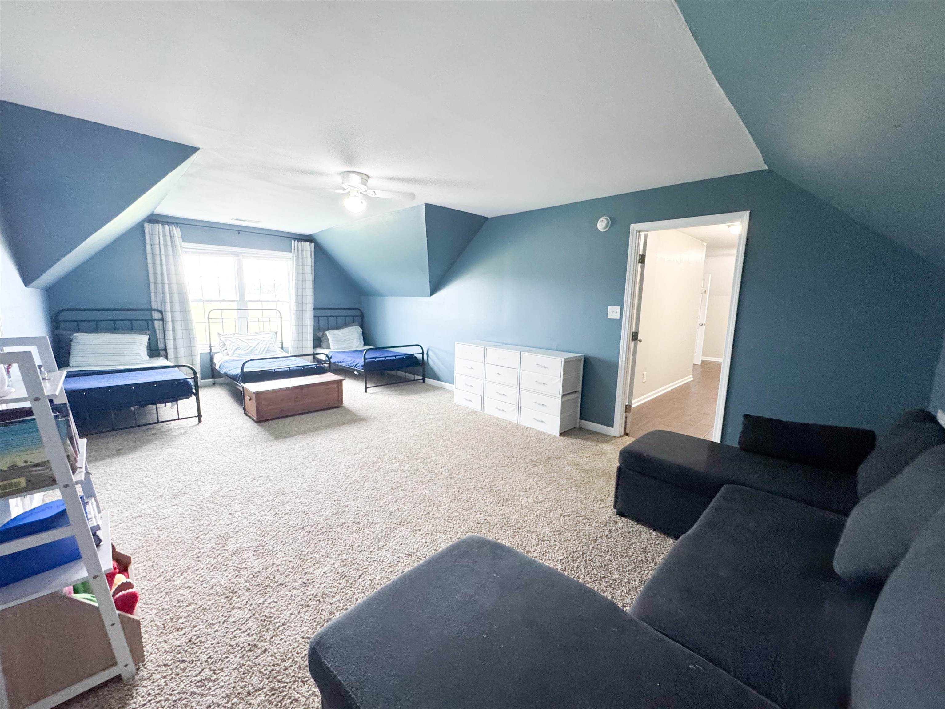 4776 Campground Road Munford, TN 38058 - Photo 19 of 25 a living room with furniture and a couch