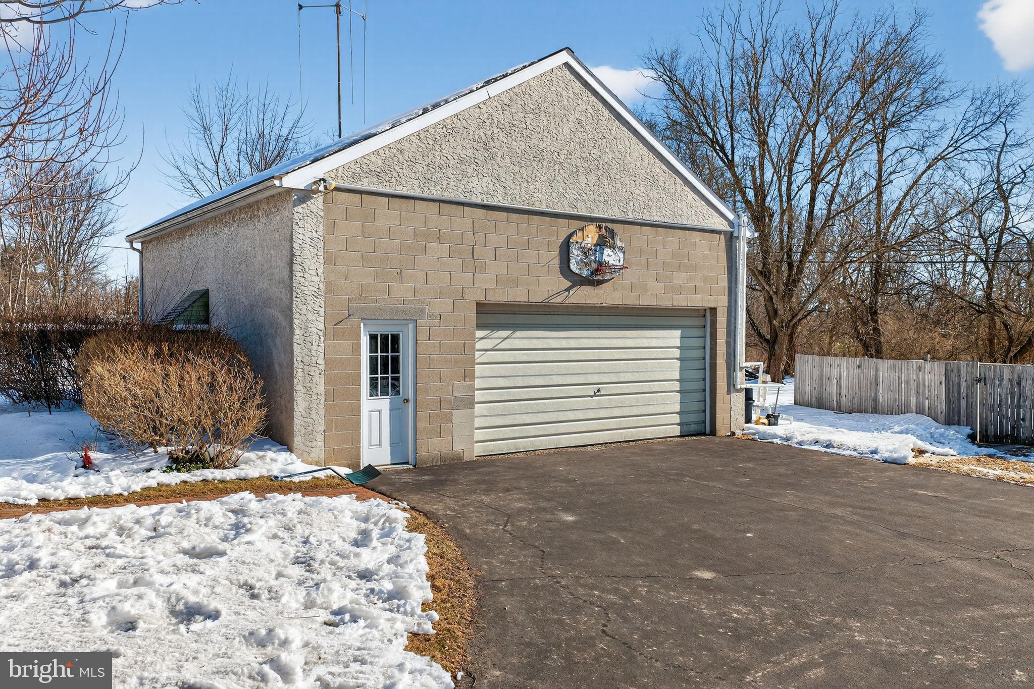2016 North Trooper Road Norristown, PA 19403 - Photo 34 of 53 Charming garage with winter landscape backdrop.