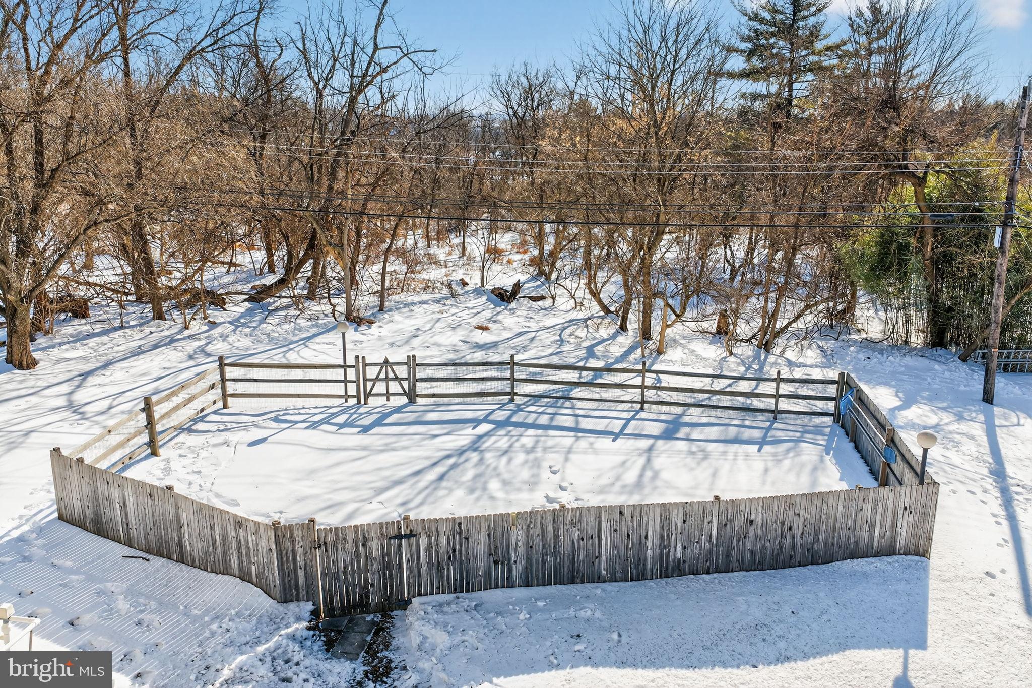 2016 North Trooper Road Norristown, PA 19403 - Photo 37 of 53 Snowy retreat with rustic fencing charm.