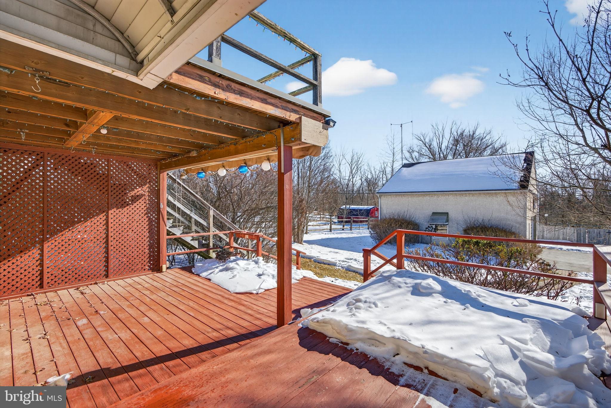 2016 North Trooper Road Norristown, PA 19403 - Photo 40 of 53 Sunny deck with winter's touch.