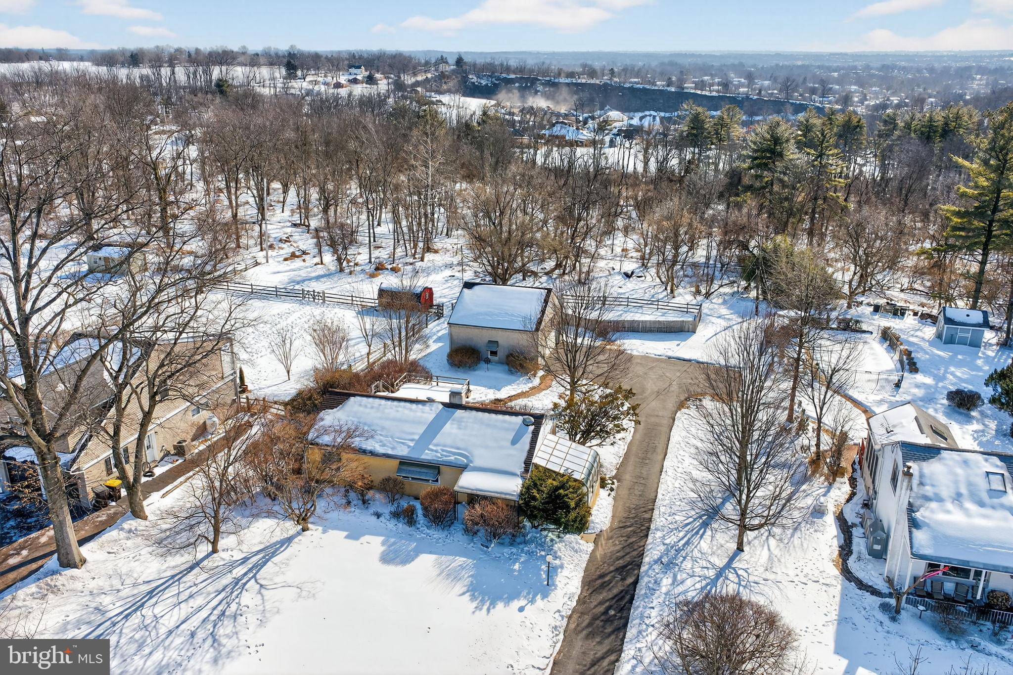 2016 North Trooper Road Norristown, PA 19403 - Photo 44 of 53 Serene winter retreat amidst snowy landscape.
