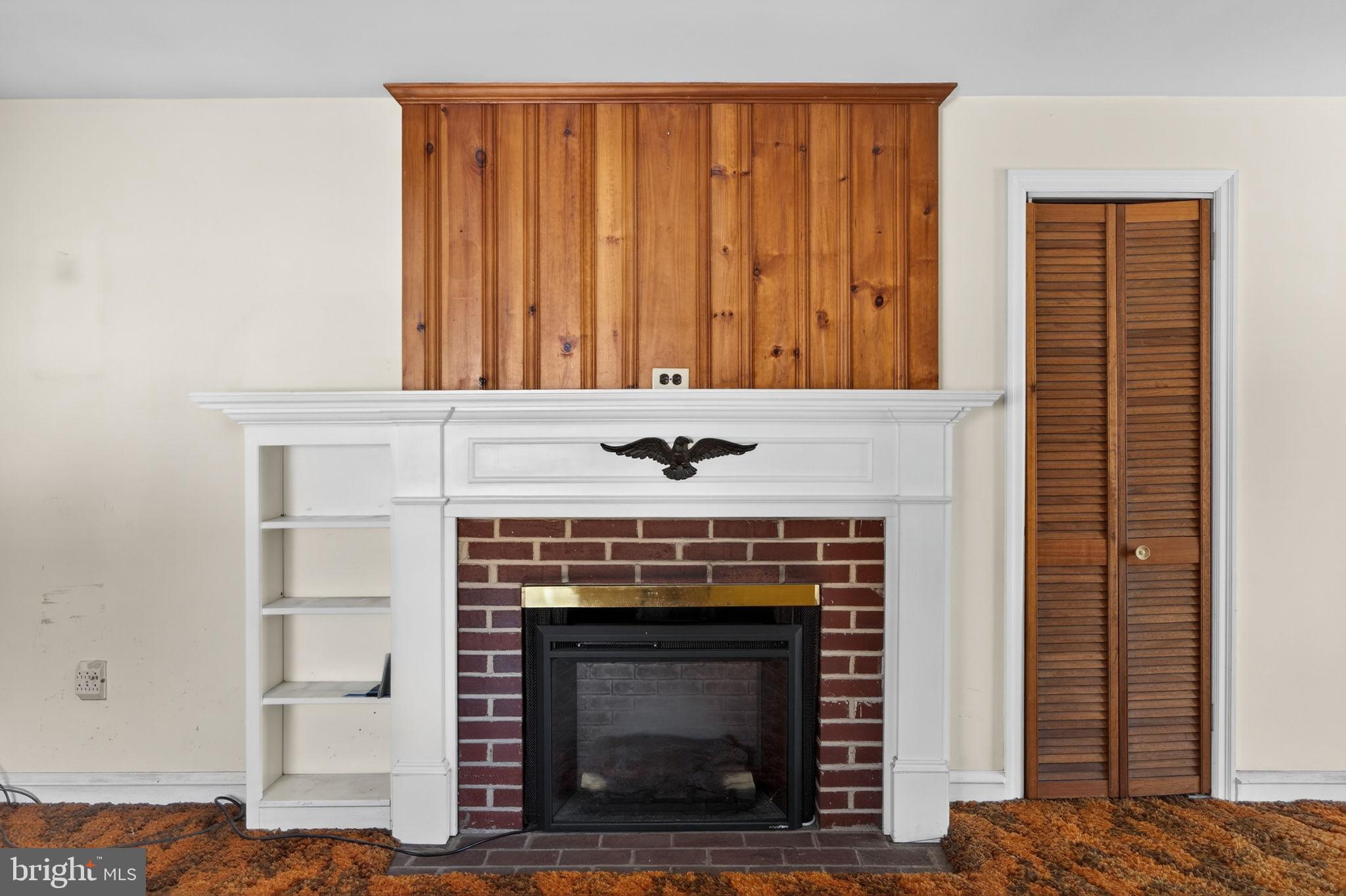 2016 North Trooper Road Norristown, PA 19403 - Photo 8 of 53 Charming fireplace with rustic wood accents.