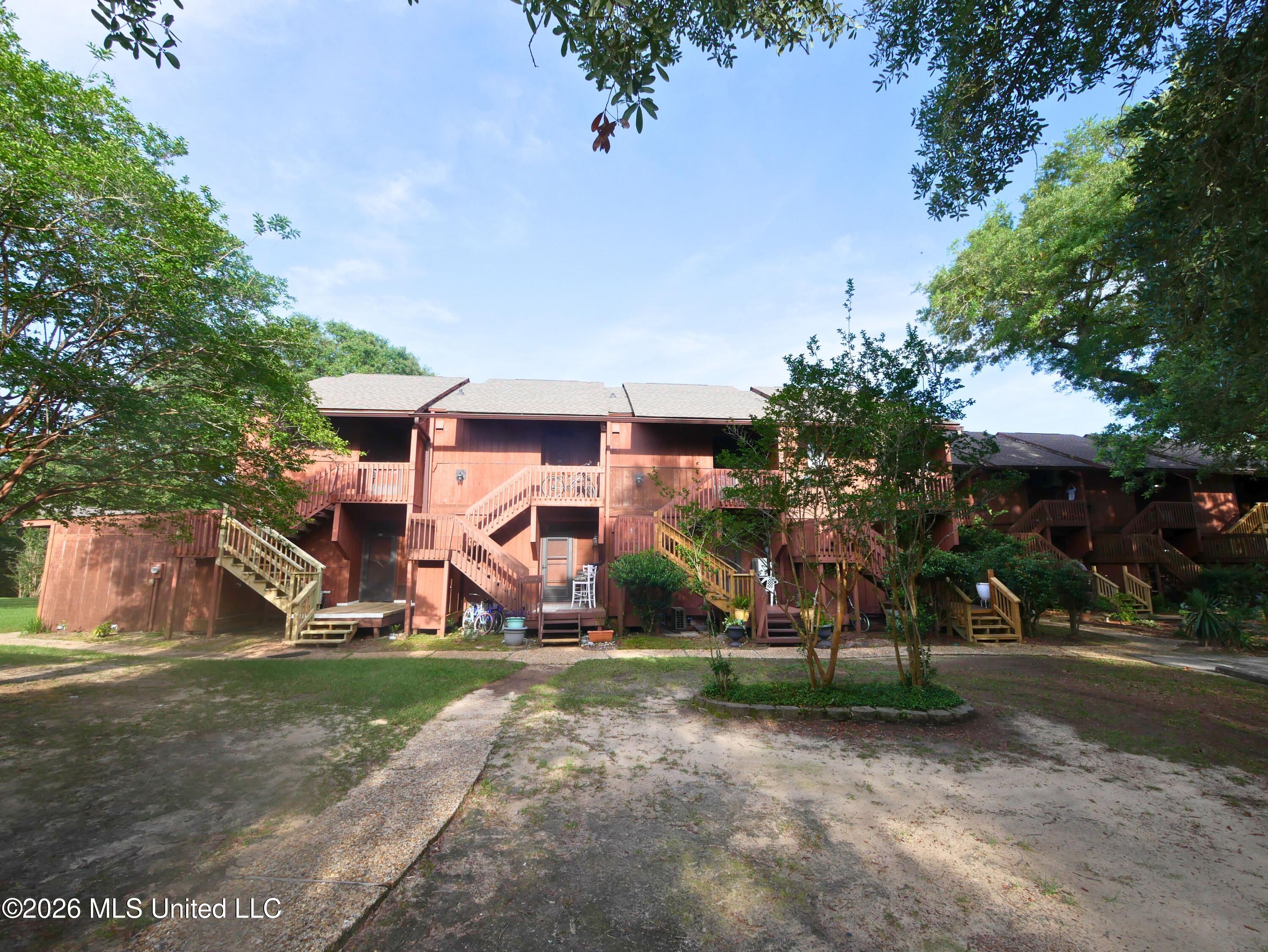208 Lakeside Villa, Unit A Diamondhead, MS 39525 - Photo 3 of 16 Untitled design (62)