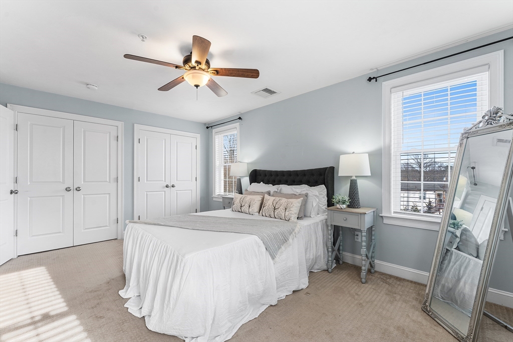 2 Mechanic Street, Unit 1 Medway, MA 02053 - Photo 13 of 32 a bedroom with a bed and a window
