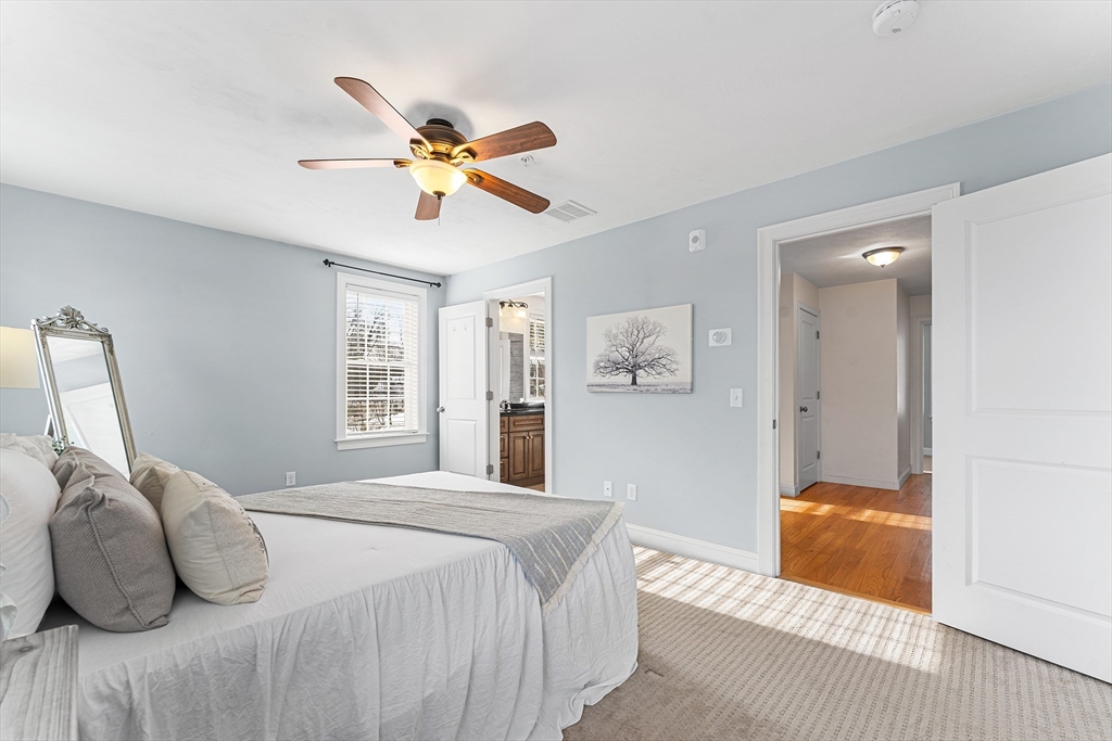 2 Mechanic Street, Unit 1 Medway, MA 02053 - Photo 15 of 32 a bedroom with a bed and window