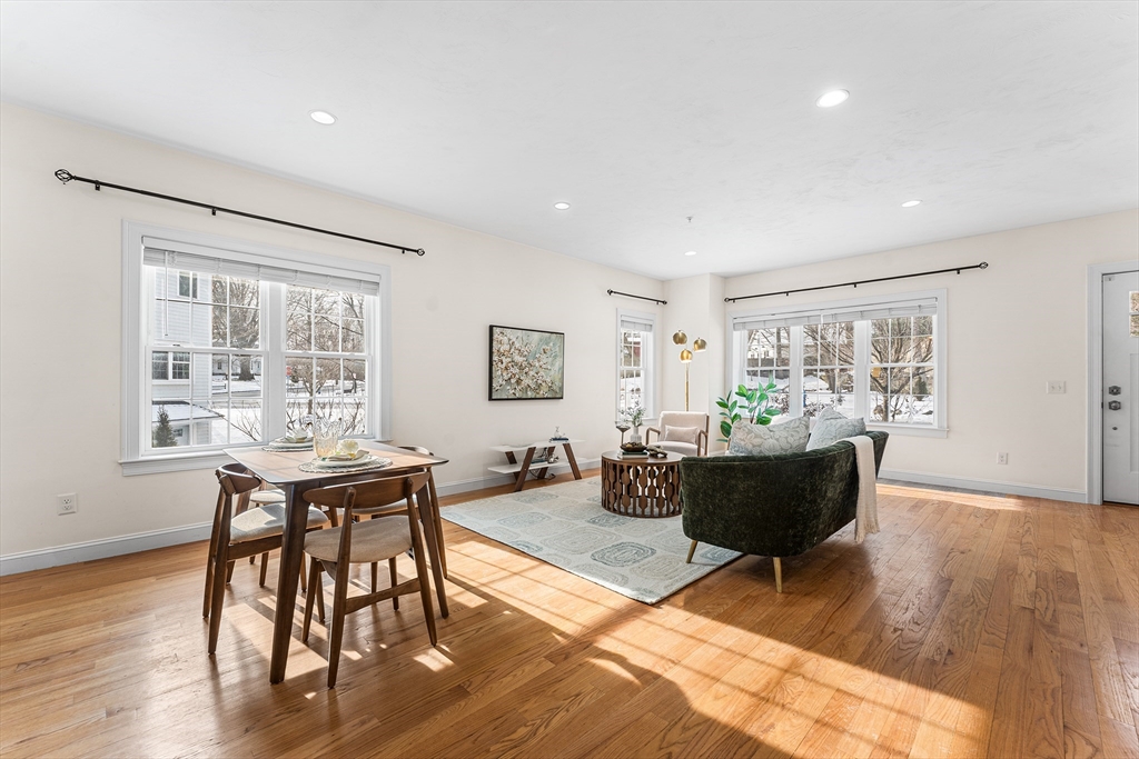 2 Mechanic Street, Unit 1 Medway, MA 02053 - Photo 5 of 32 a living room with furniture a rug and a window