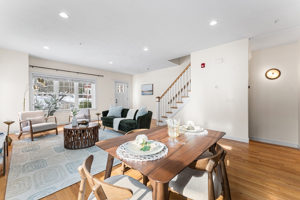 2 Mechanic Street, Unit 1 Medway, MA 02053 - Photo 6 of 32 a view of a dining room with furniture window and wooden floor