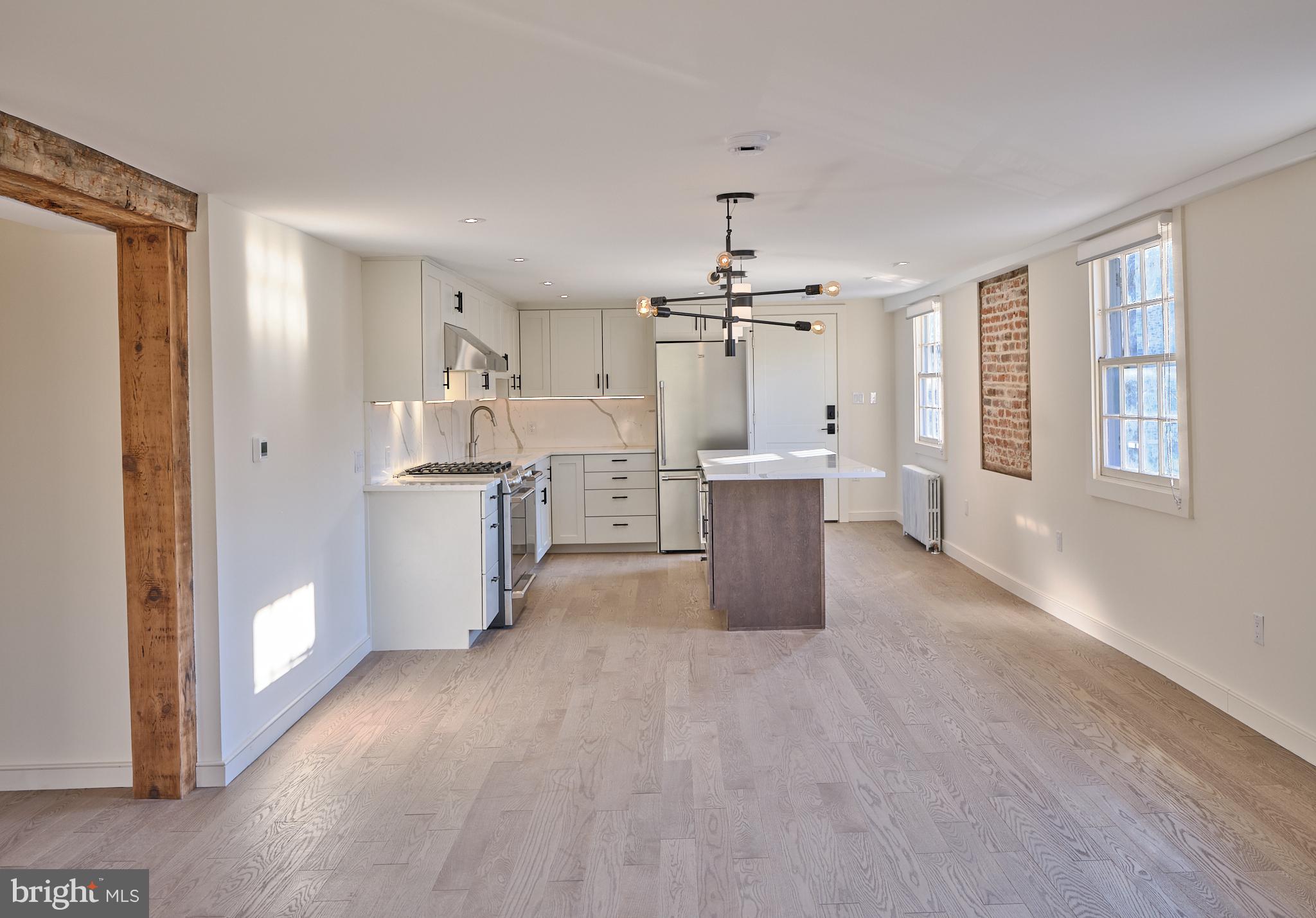 44 South Main Street, Unit 2N New Hope, PA 18938 - Photo 7 of 23 a view of a electric appliances and windows in a room
