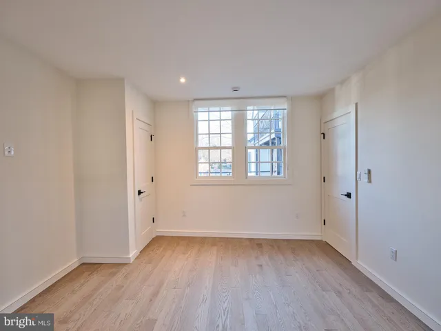 a view of a kitchen and a window