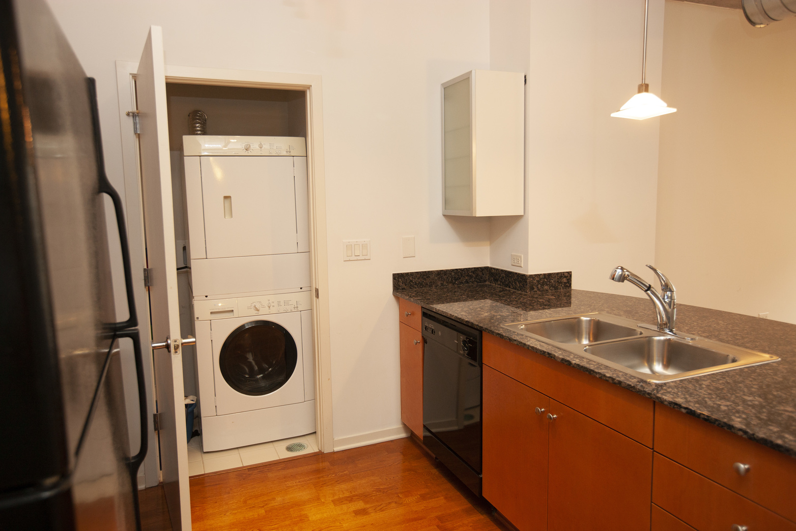 807 Davis Street, Unit 505 Evanston, IL 60201 - Photo 6 of 17 a bathroom with a sink and a mirror
