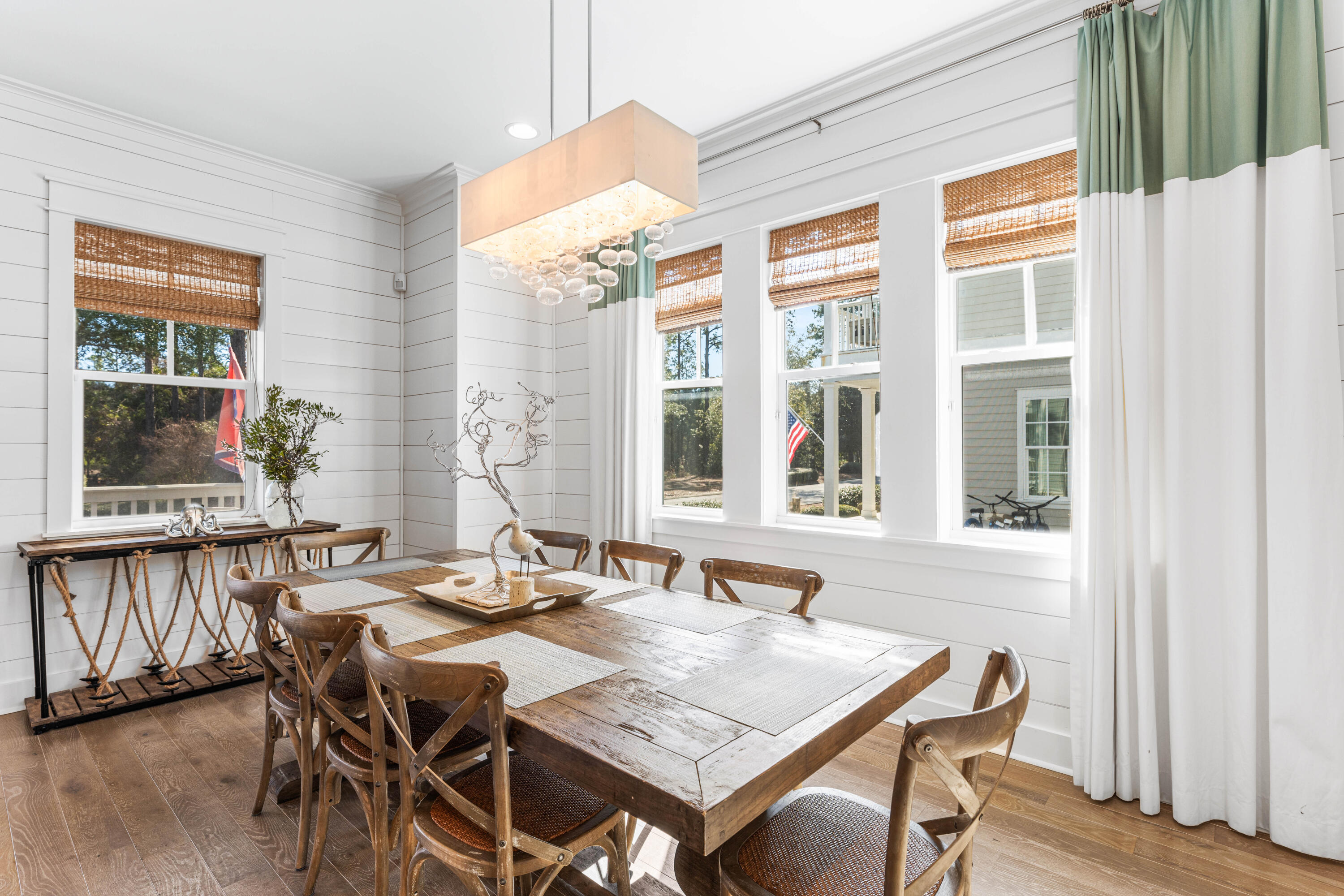 313 East Royal Fern Way Santa Rosa Beach, FL 32459 - Photo 12 of 48 a dining room with furniture window and wooden floor