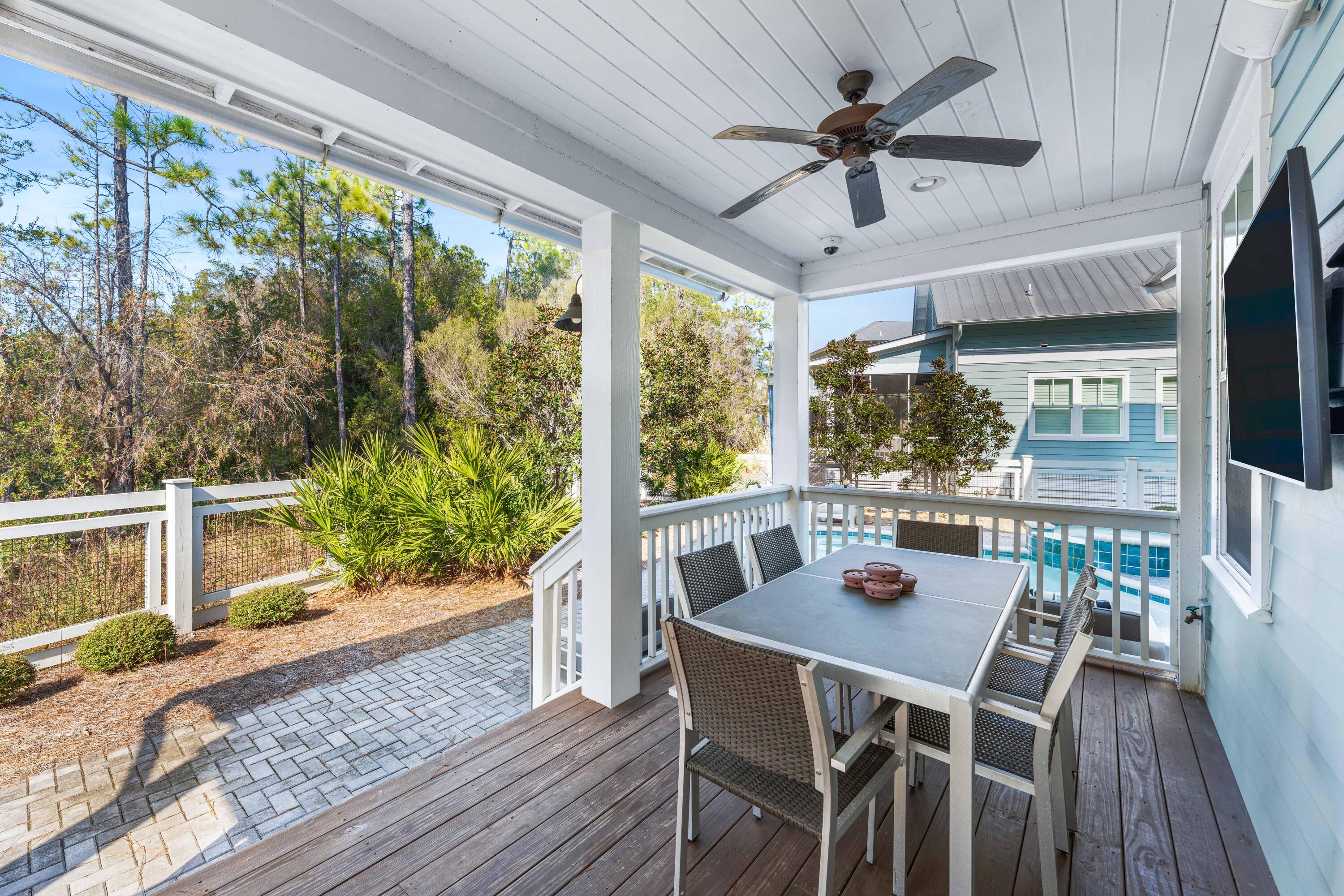 313 East Royal Fern Way Santa Rosa Beach, FL 32459 - Photo 15 of 48 a view of a dining room with furniture window and wooden floor