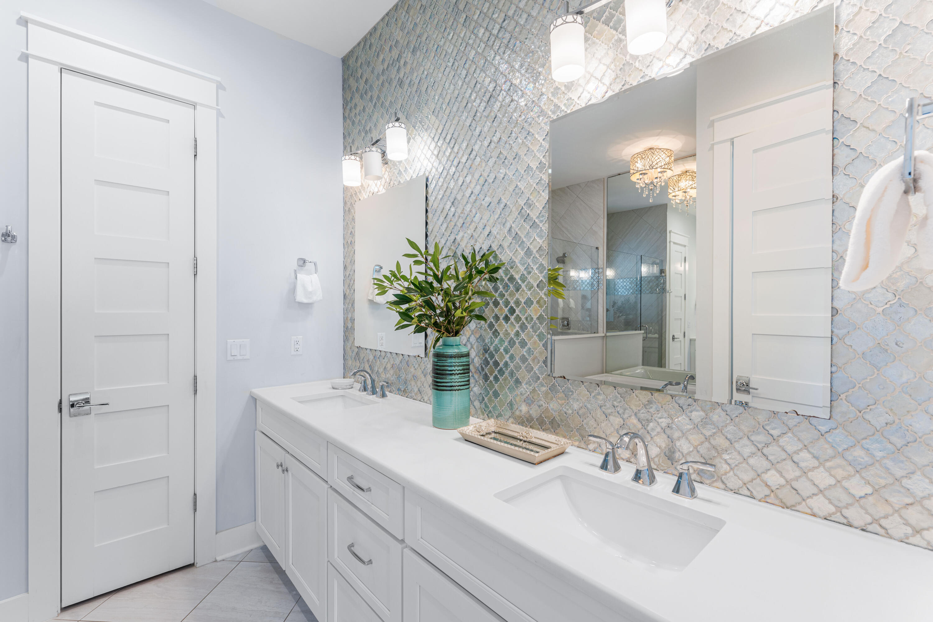 313 East Royal Fern Way Santa Rosa Beach, FL 32459 - Photo 23 of 48 a bathroom with a sink and a mirror