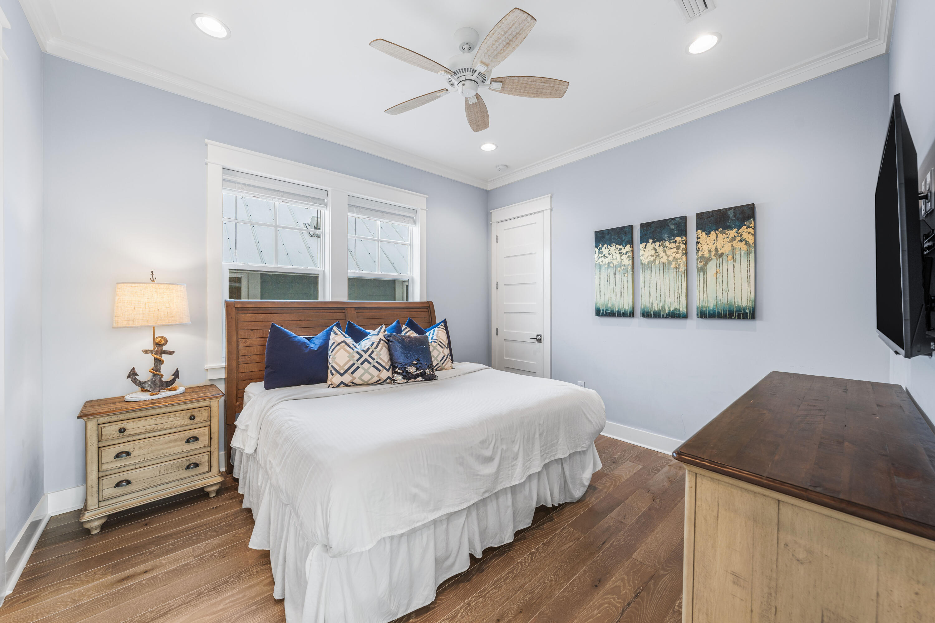 313 East Royal Fern Way Santa Rosa Beach, FL 32459 - Photo 25 of 48 a bedroom with bed and window