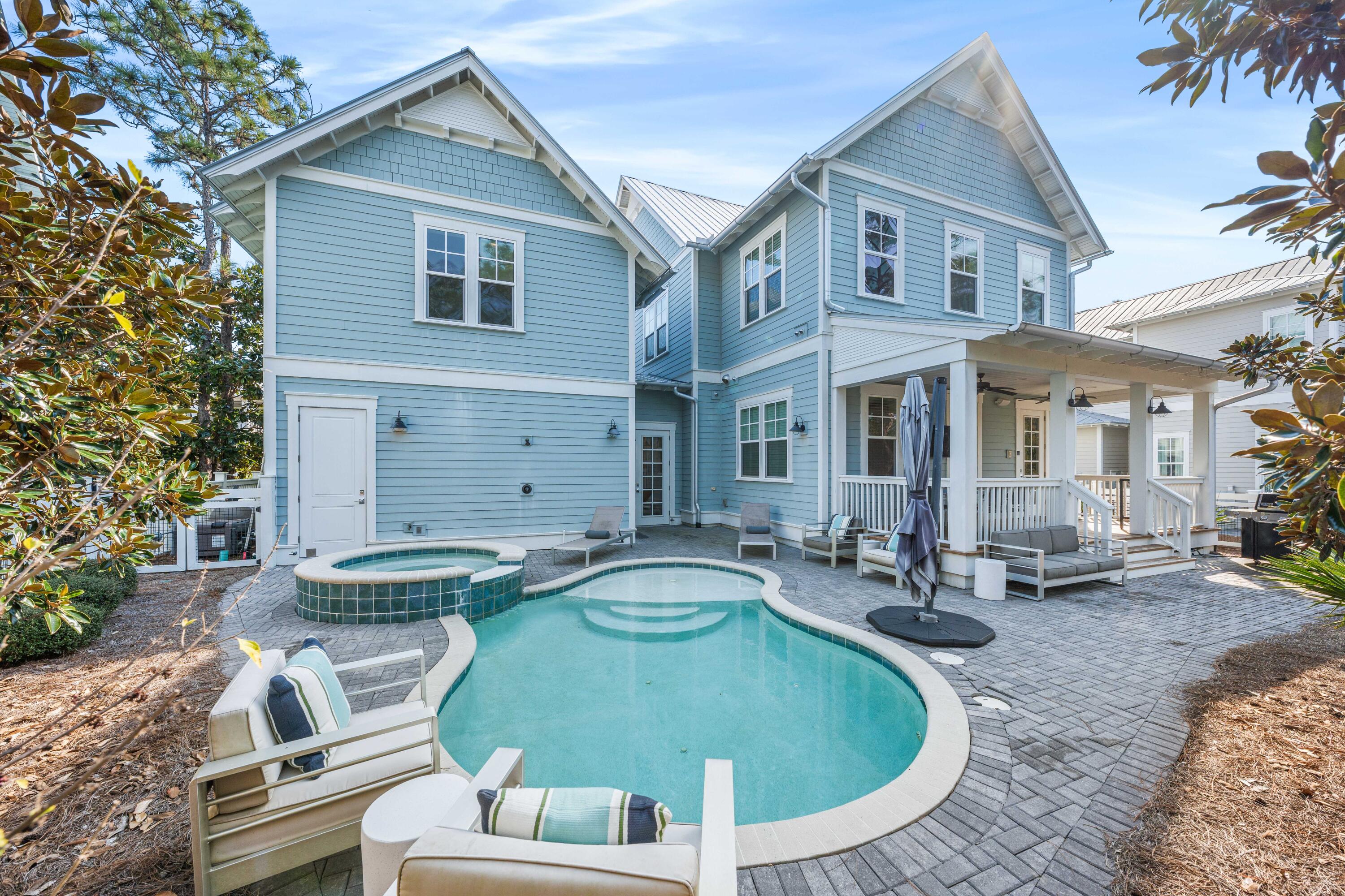 313 East Royal Fern Way Santa Rosa Beach, FL 32459 - Photo 3 of 48 a front view of a house with swimming pool
