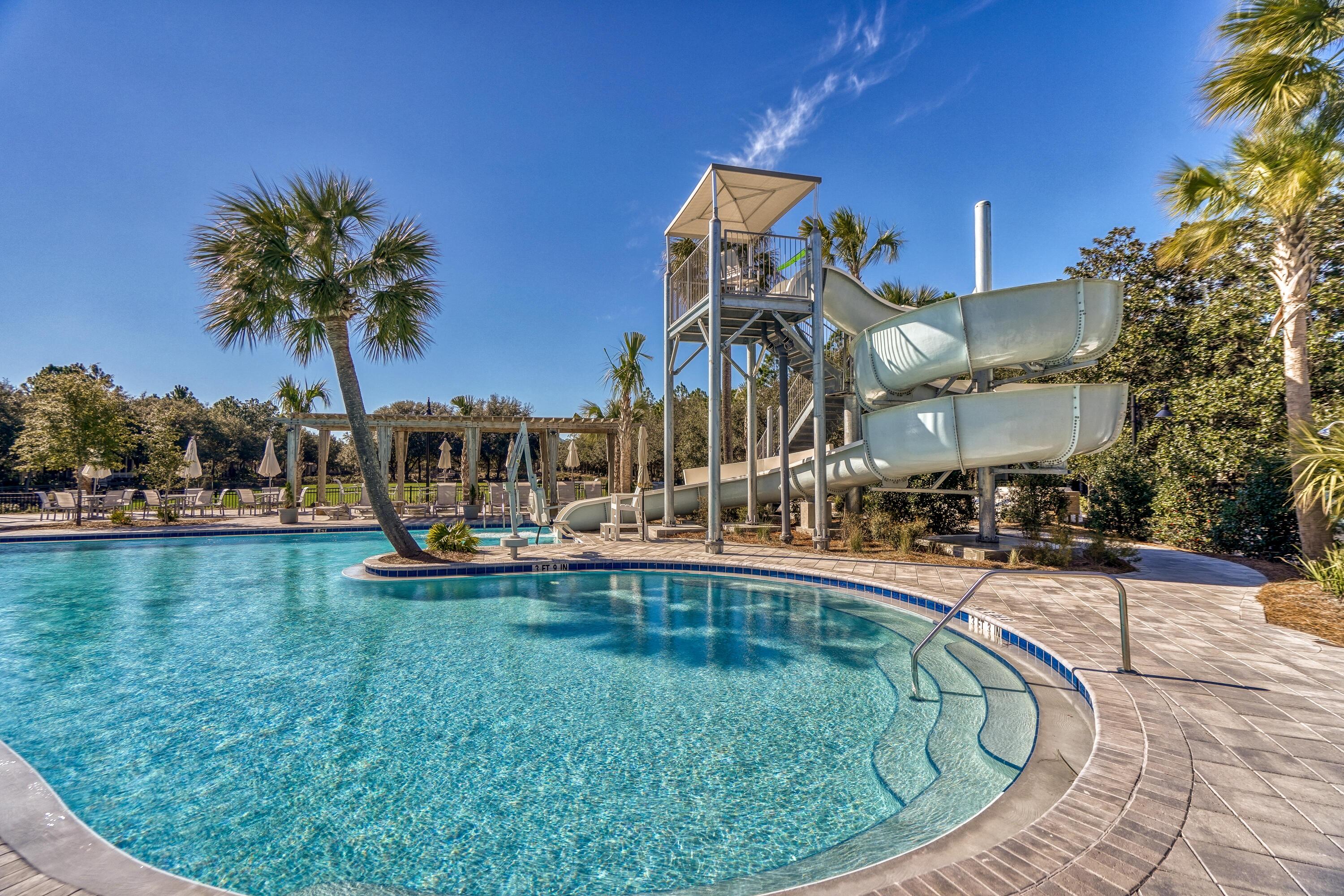 313 East Royal Fern Way Santa Rosa Beach, FL 32459 - Photo 44 of 48 a swimming pool with outdoor seating and yard