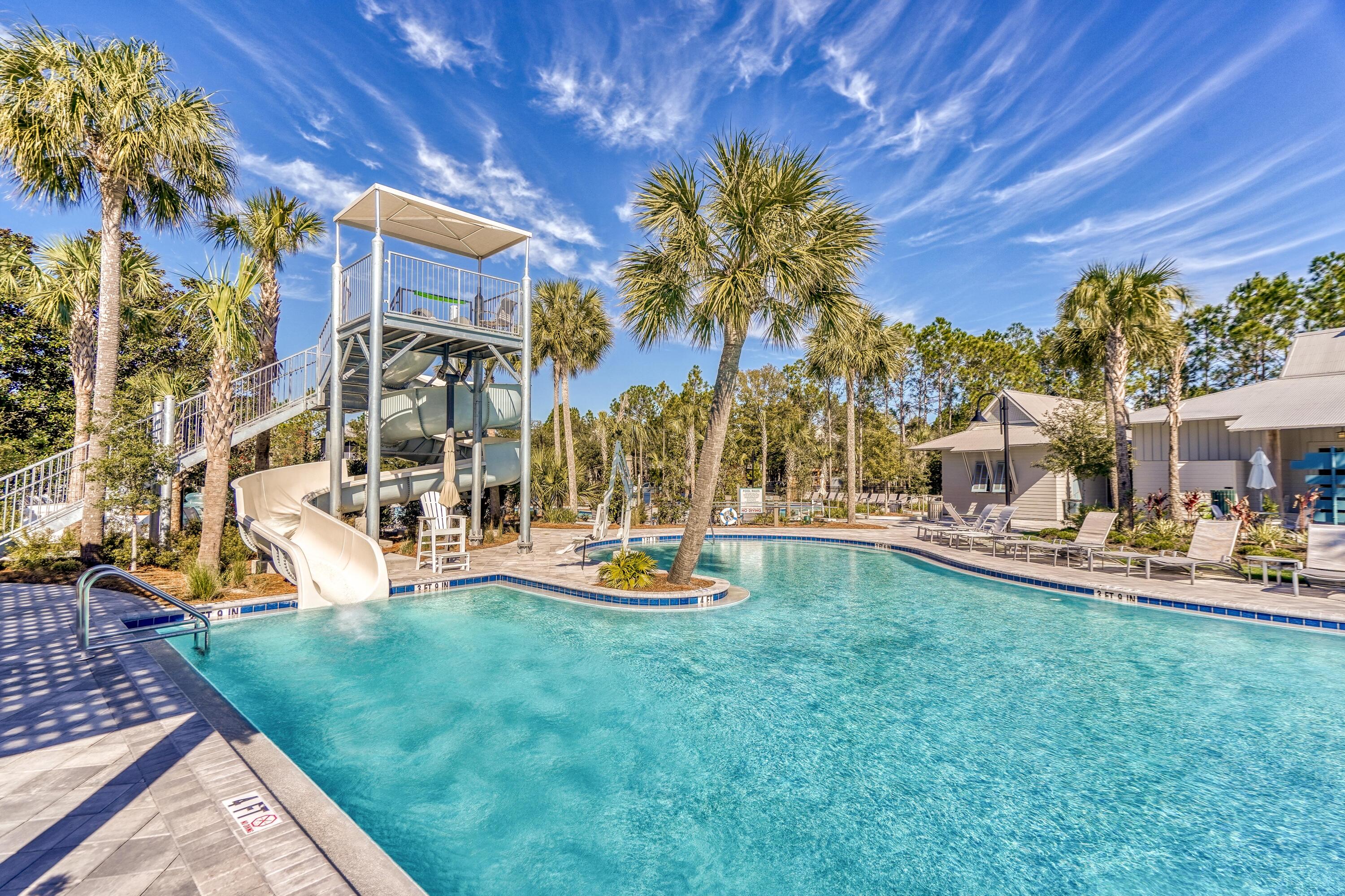313 East Royal Fern Way Santa Rosa Beach, FL 32459 - Photo 45 of 48 a view of a house with a yard porch and sitting area