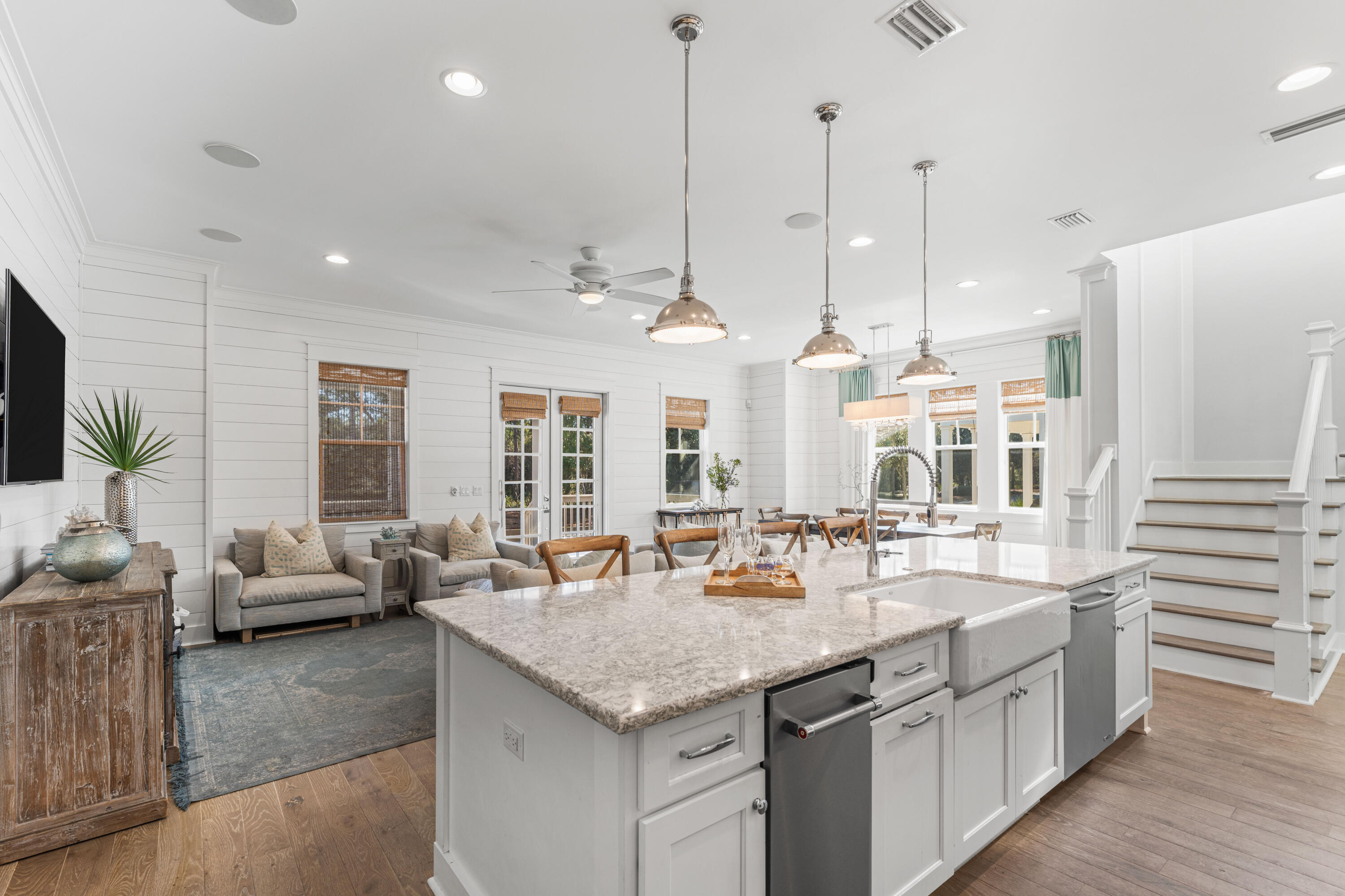313 East Royal Fern Way Santa Rosa Beach, FL 32459 - Photo 9 of 48 a kitchen with center island appliances and living room view
