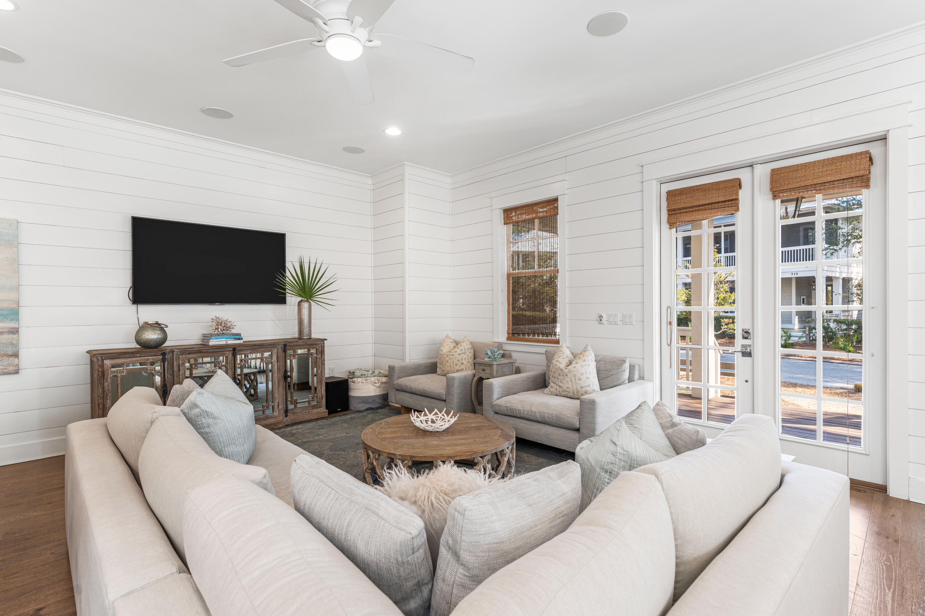 313 East Royal Fern Way Santa Rosa Beach, FL 32459 - Photo 10 of 48 a living room with furniture and a flat screen tv