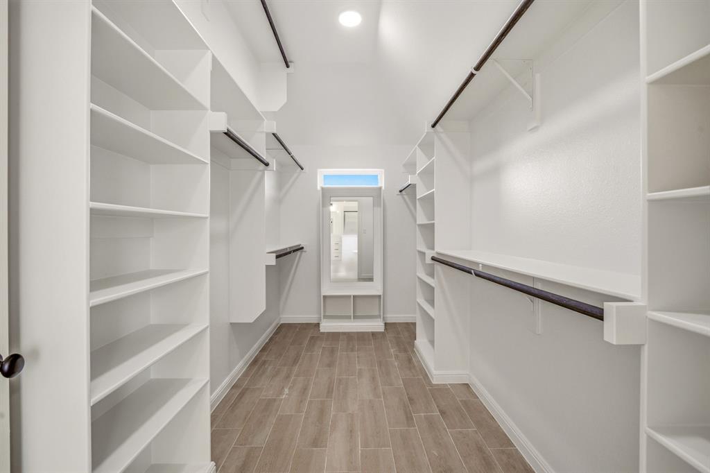 3155 Infinity Drive Weatherford, TX 76087 - Photo 24 of 39 Walk in closet with wood finish floors