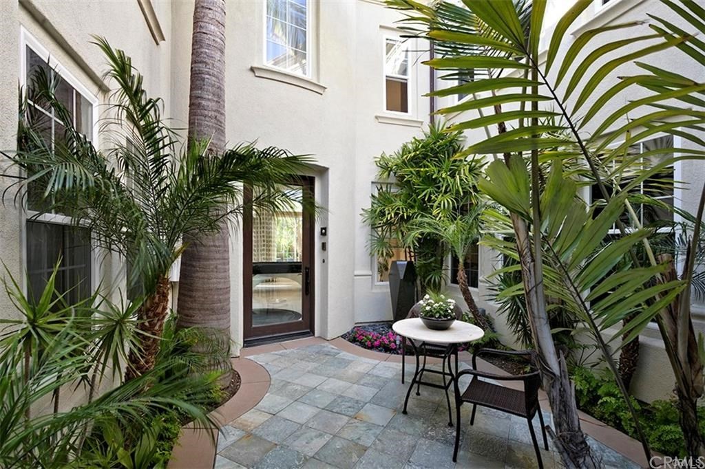 28362 Via Pasito San Juan Capistrano, CA 92675 - Photo 9 of 14 a potted plant sitting in front of a house