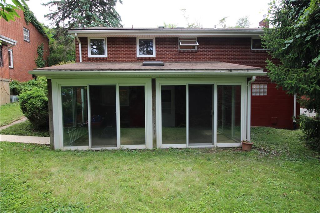 10109 Pearl Road Pittsburgh, PA 15235 - Photo 16 of 23 The enclosed sun room has sliding doors on all sides so it can open up and let the nice weather flow through.