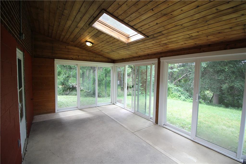 10109 Pearl Road Pittsburgh, PA 15235 - Photo 6 of 23 This beautiful sun room has views to the tree-lined back yard, cedar-plank ceiling, and cement floor. Enjoying the seasons year-round is a breeze with room to add any of your most relaxing furniture.