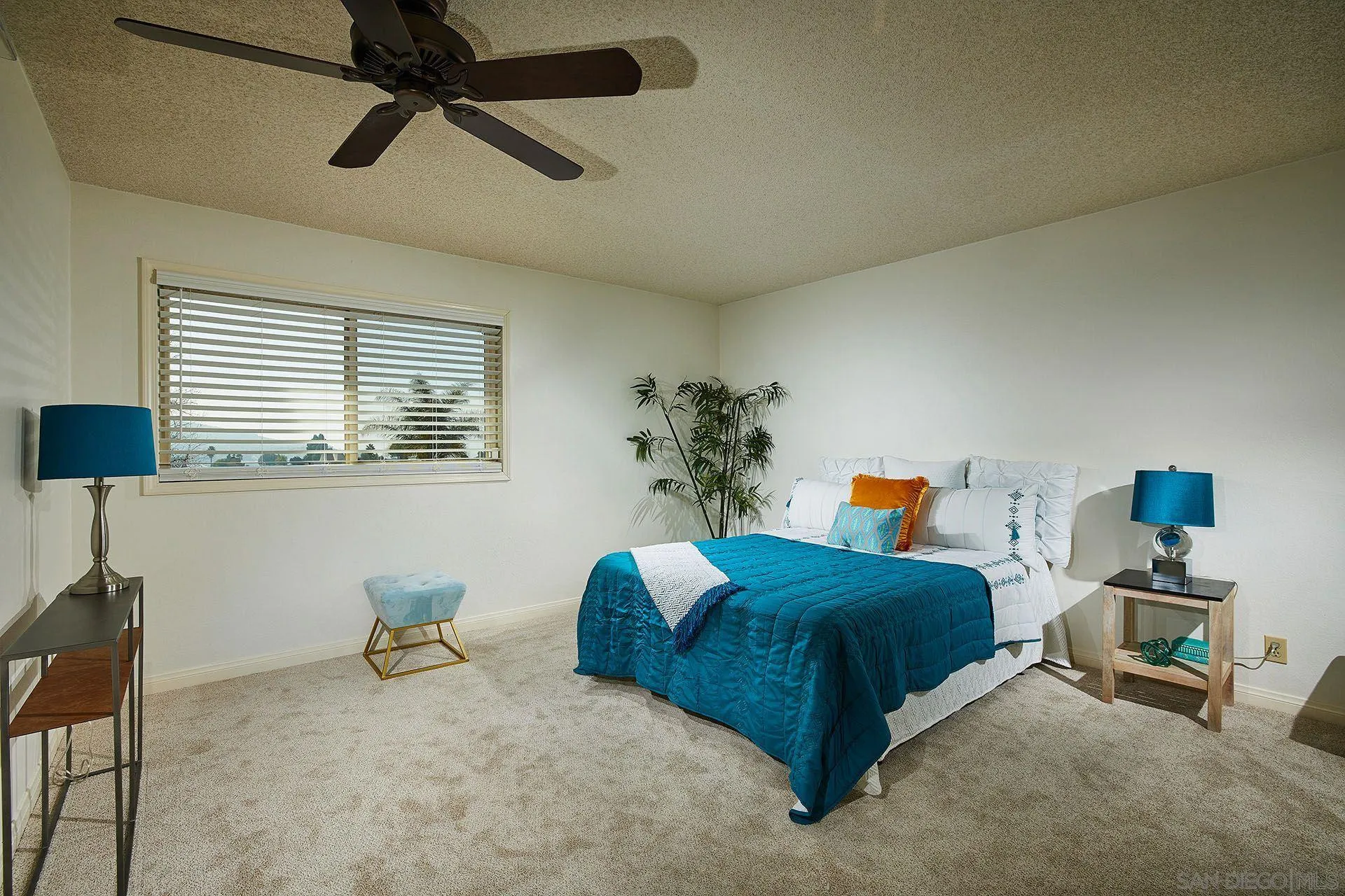 3007 Ruttles Court Spring Valley, CA 91978 - Photo 21 of 22 a bedroom with furniture and a window