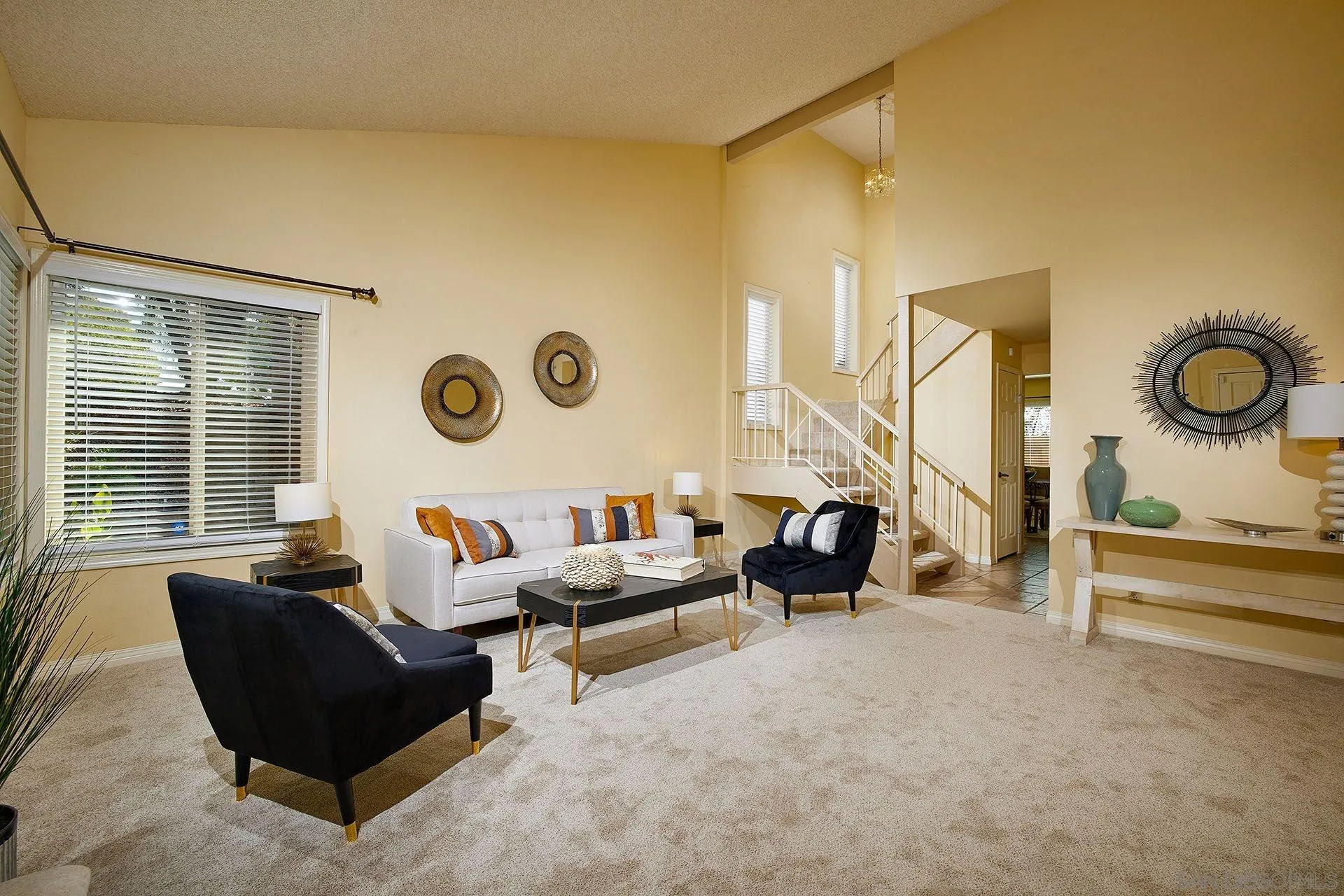 3007 Ruttles Court Spring Valley, CA 91978 - Photo 3 of 22 a living room with furniture and a large window