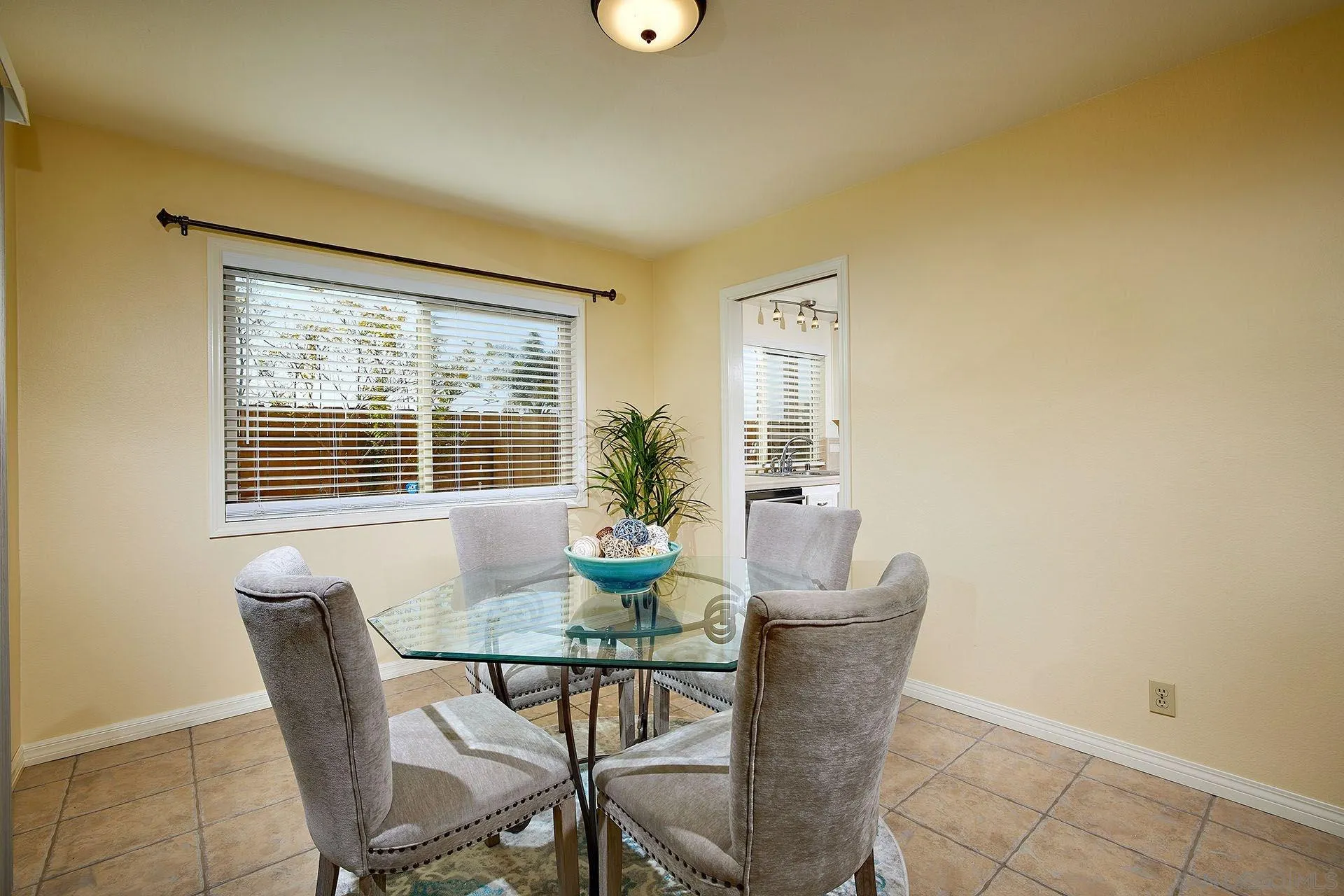 3007 Ruttles Court Spring Valley, CA 91978 - Photo 7 of 22 a dining room with furniture and window